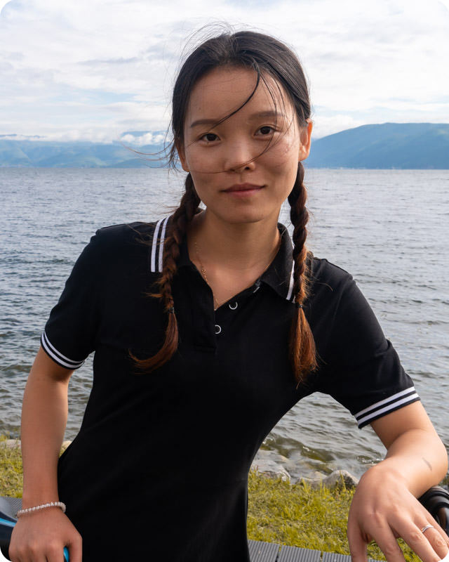 A picture of Ella infront of Erhai Lake, Dali