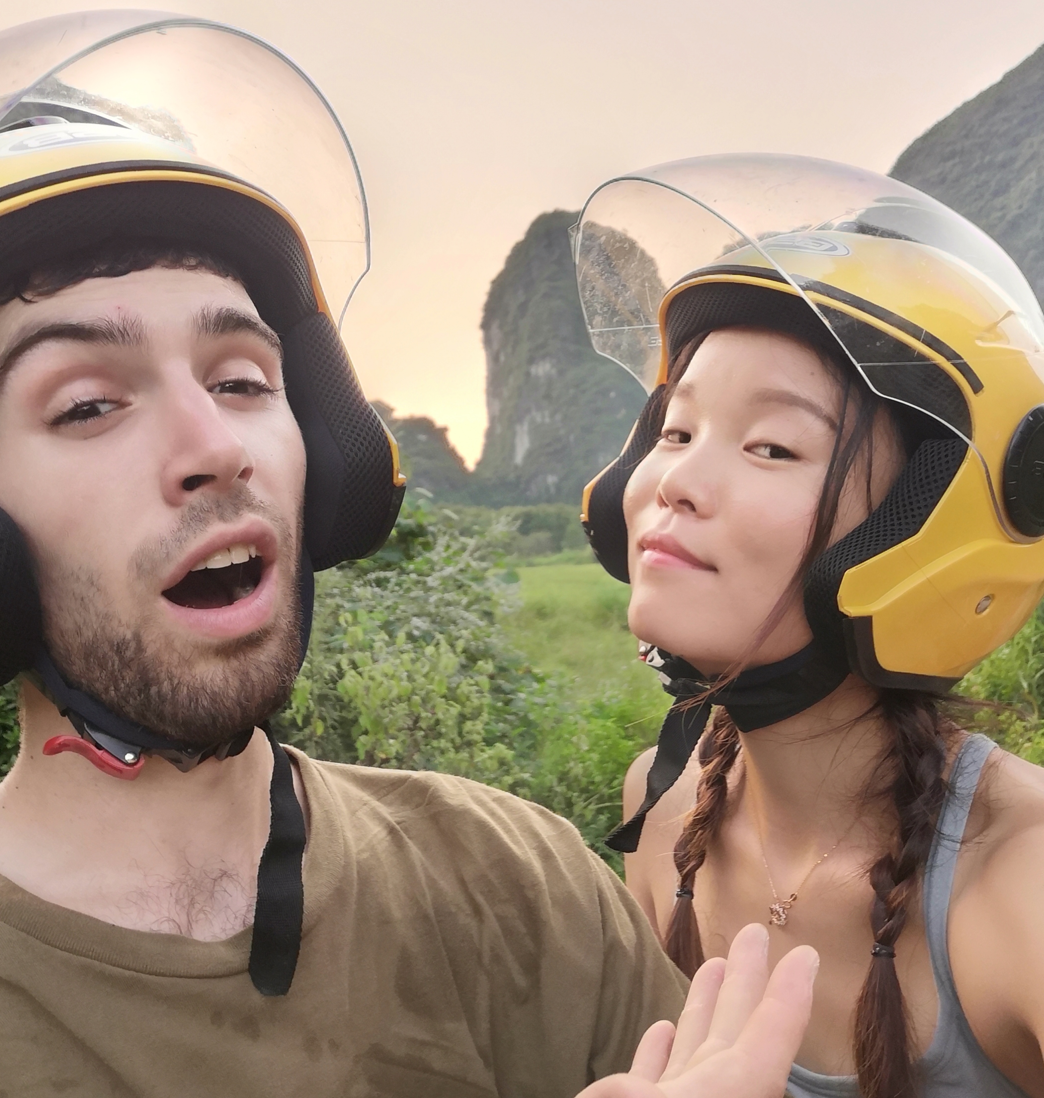 Scott and Ella goofing around in helmets